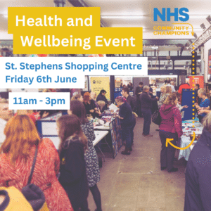 Photograph shows a crowd of people at a busy event with stalls with text overlaid: Health and Wellbeing Event St Stephens Shopping Centre Friday 6th June 11am- 3pm